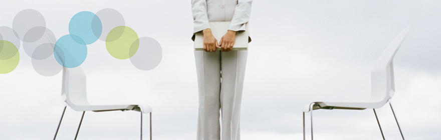 business-woman-between-two-white-chairs-banner